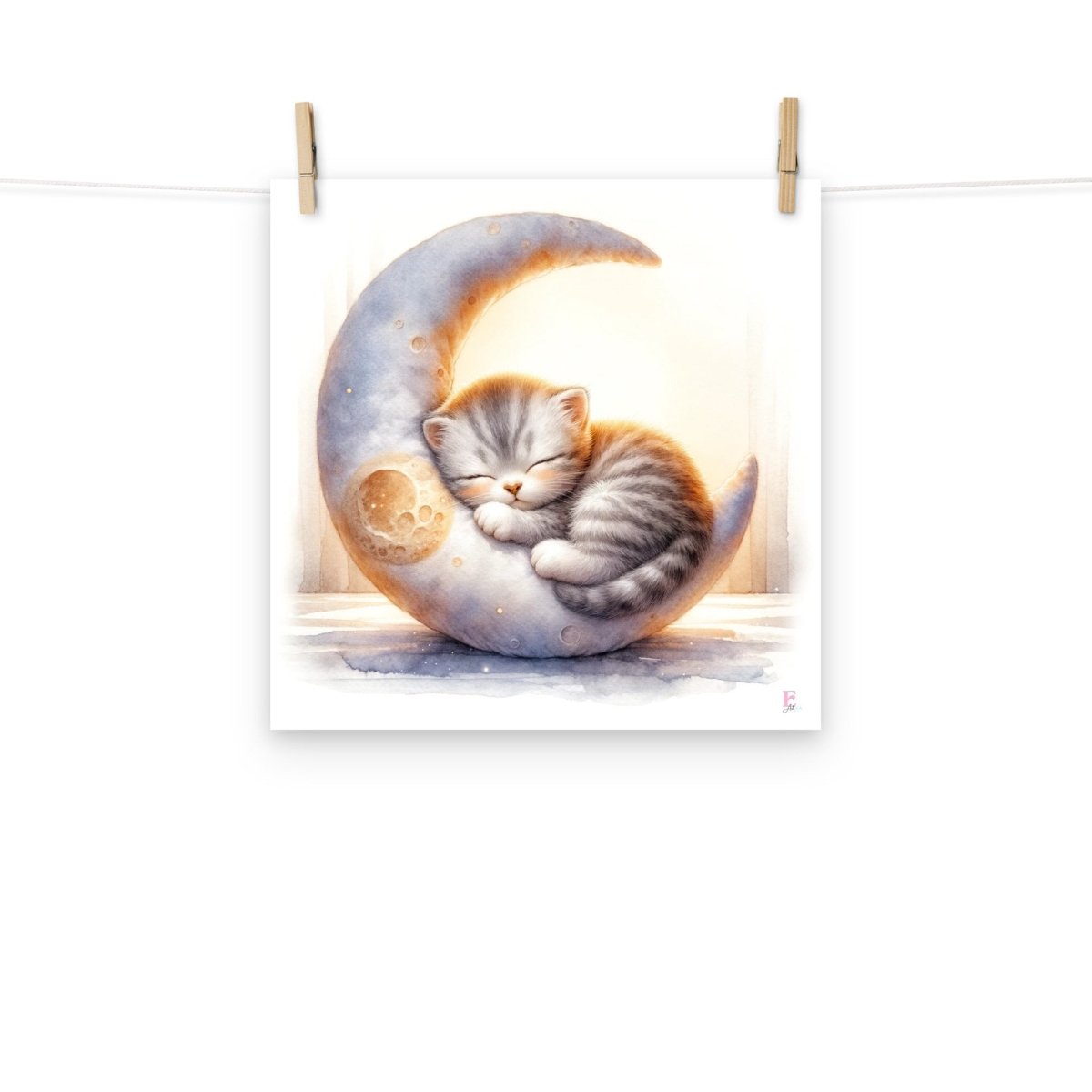 Kitten sleeping on the moon print