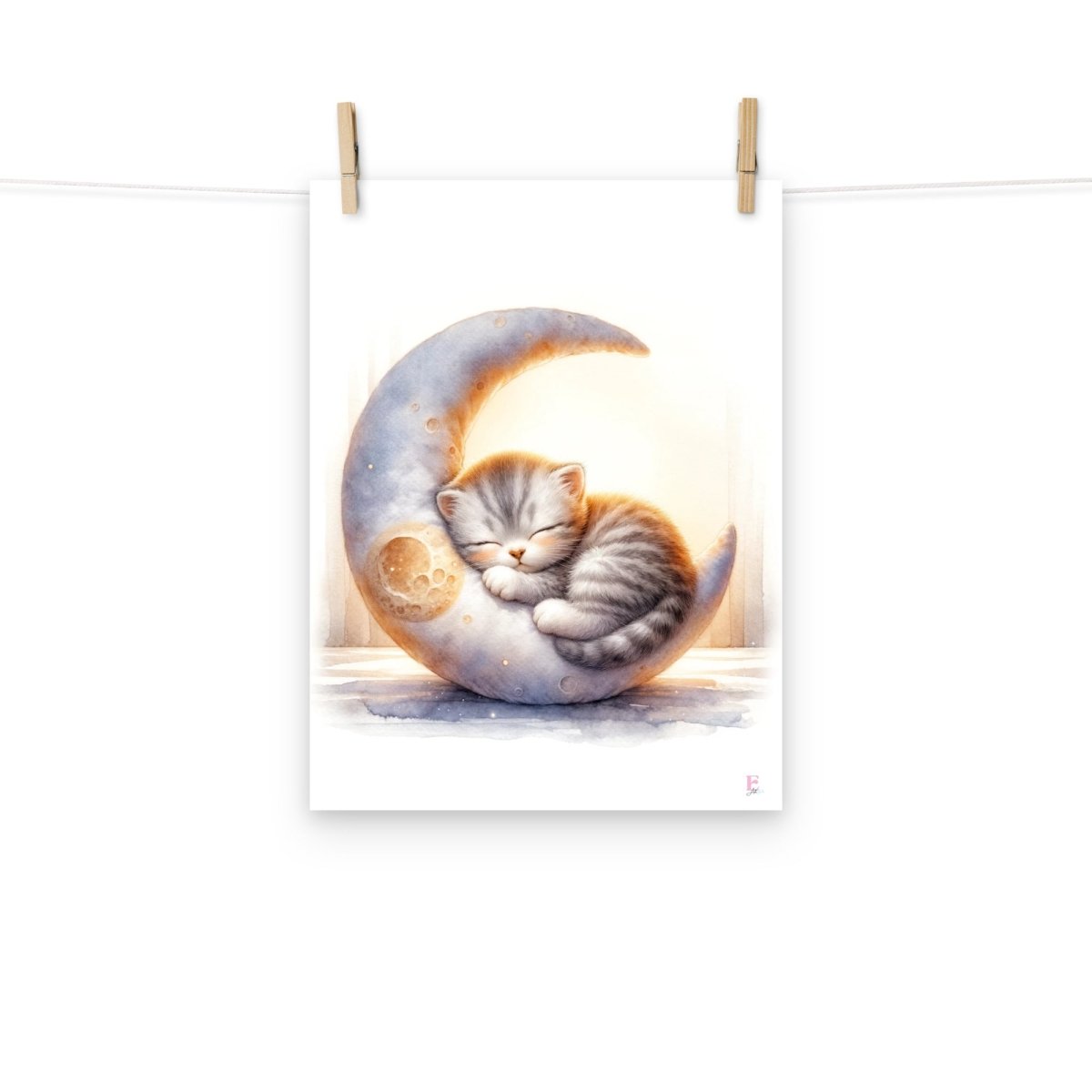 Kitten sleeping on the moon print